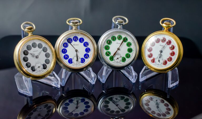 A group of clocks on display Description automatically generated