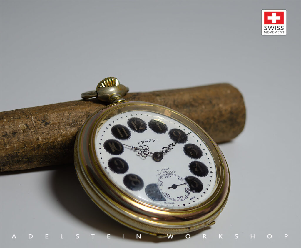 Restored bronze case of Arnex pocket watch